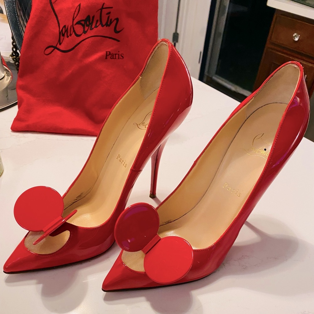 Red Madame Mouse Christian Louboutin heels.